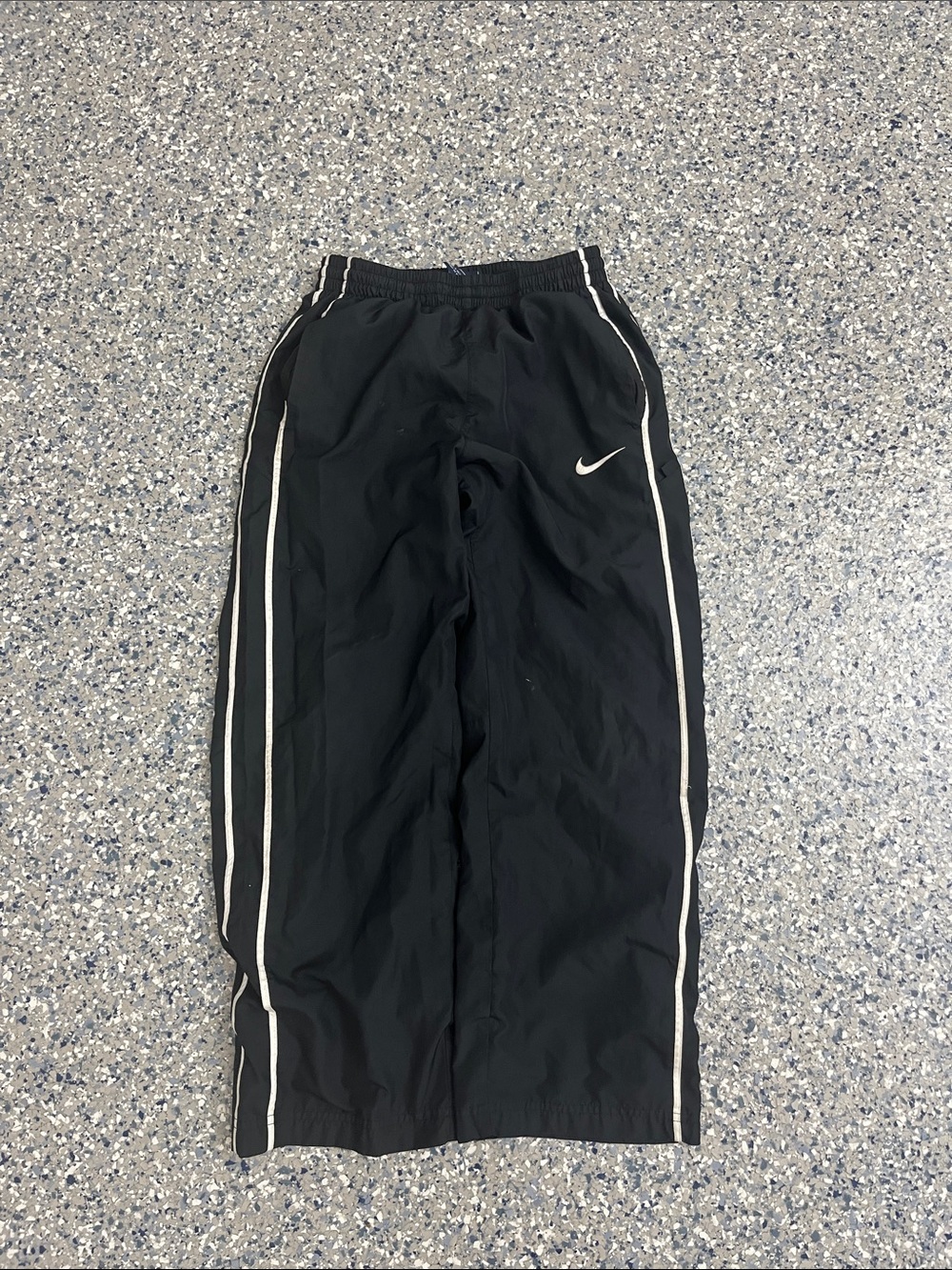 Black Nike track pants